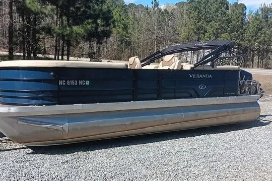 The Image of 2023 Veranda Vista View 22RC pontoon boat parked on gravel surface. - 0