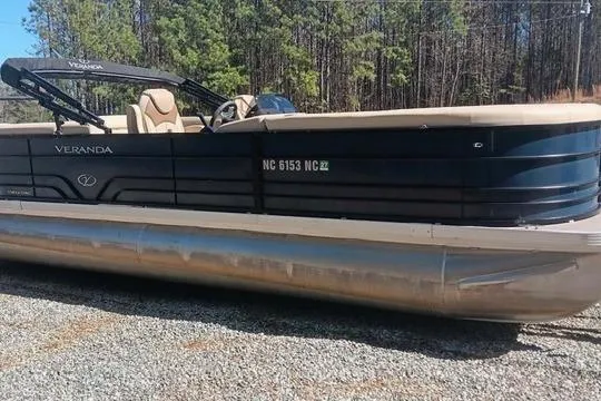 Slide: The Image of 2023 Veranda Vista View 22RC pontoon boat on gravel surface. - 8