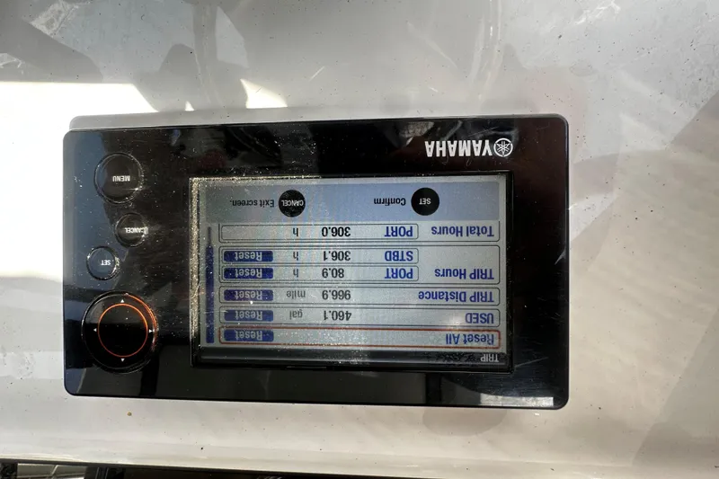 Slide: The Image of Yamaha display on 2018 Sea Hunt Gamefish 27, showing trip data and settings. - 10