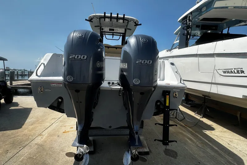 Slide: The Image of 2018 Sea Hunt Gamefish 27 with twin Yamaha 200 engines at dockside. - 11
