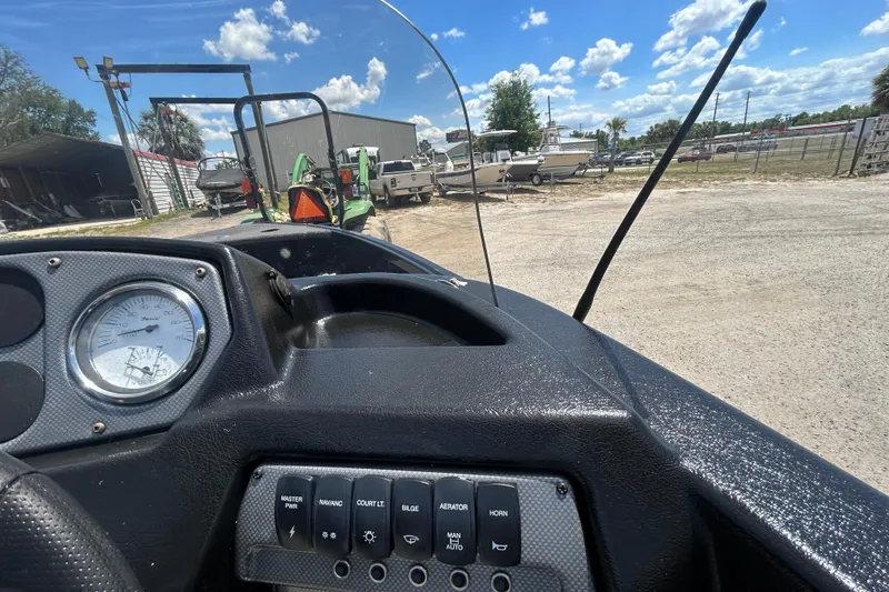 Slide: The Image of Dashboard view of 2023 Competitor 165 SC boat with control panel and gauge. - 7
