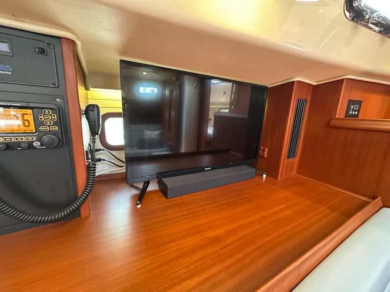 Slide: The Image of Interior of 2021 Island Packet 439 yacht with TV and communication equipment. - 48