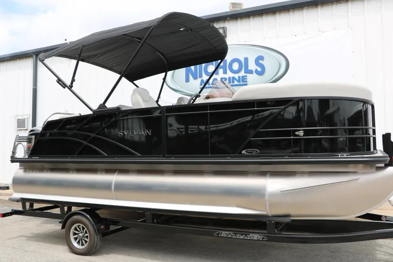 The Image of 2026 Sylvan Mirage Cruise 8520 CLZ DH pontoon boat on trailer at Nichols Marine. - 0