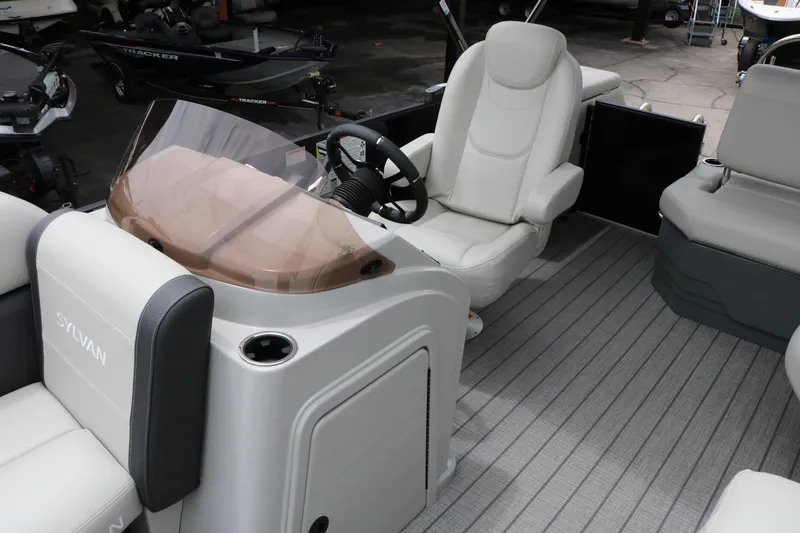 Slide: The Image of 2026 Sylvan Mirage Cruise 8520 CLZ DH pontoon boat interior with helm and seating. - 29