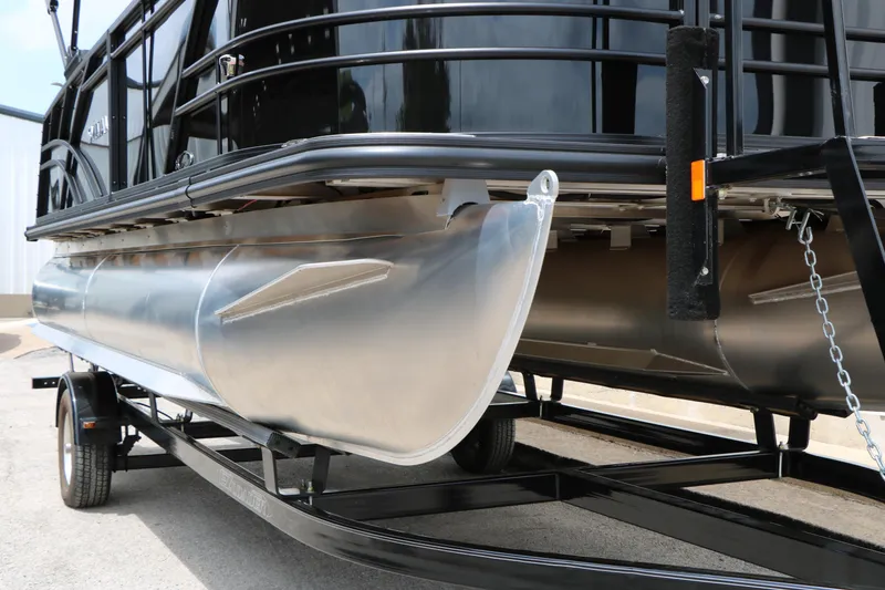 Slide: The Image of 2026 Sylvan Mirage Cruise 8520 CLZ DH pontoon boat on trailer, close-up view. - 4