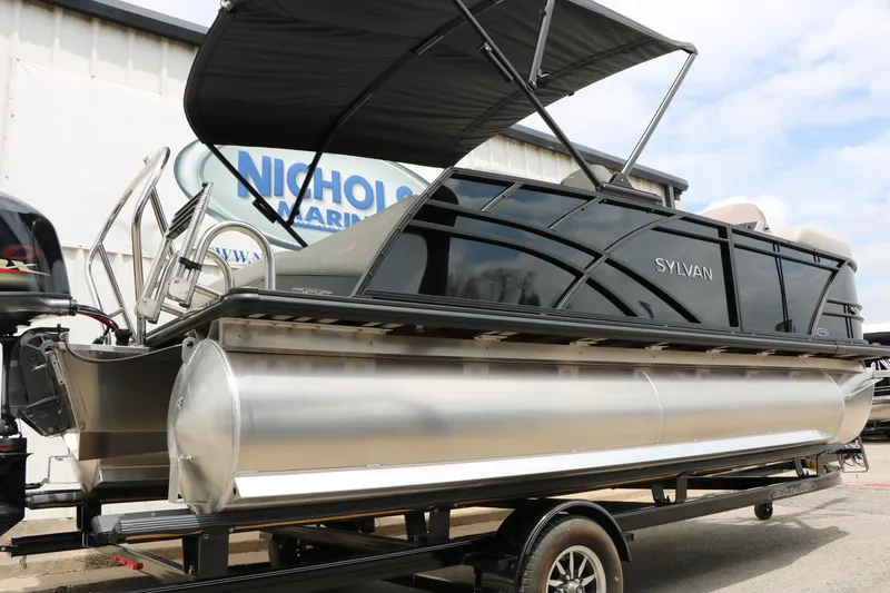 Slide: The Image of 2026 Sylvan Mirage Cruise 8520 CLZ DH pontoon boat with sleek design and canopy. - 6