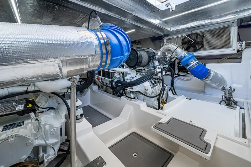 Slide: The Image of Engine room of 2026 Maritimo M50 yacht, showcasing advanced machinery and components. - 102