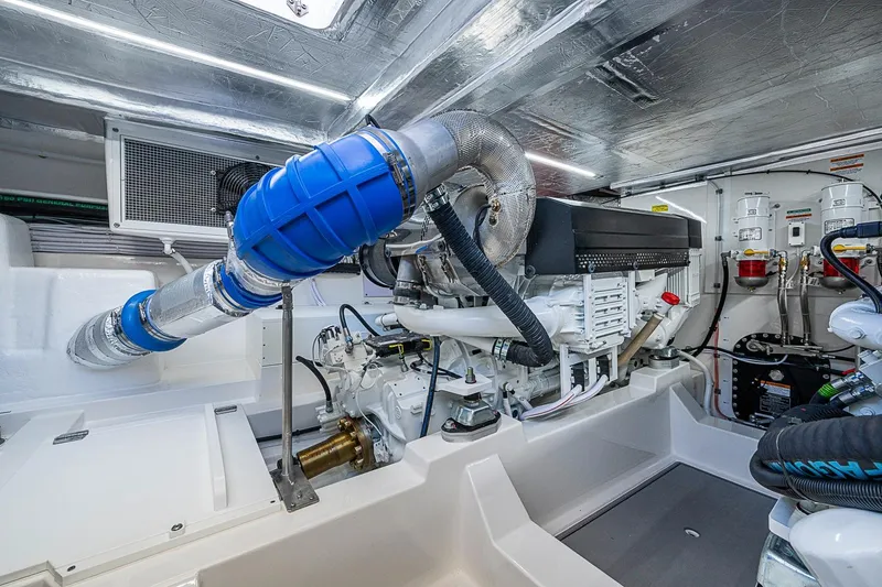 Slide: The Image of Engine room of 2026 Maritimo M50 yacht, showcasing advanced machinery and components. - 104