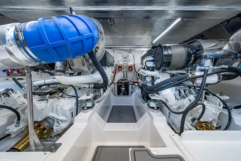 Slide: The Image of Engine room of 2026 Maritimo M50 yacht, featuring advanced machinery and sleek design. - 106