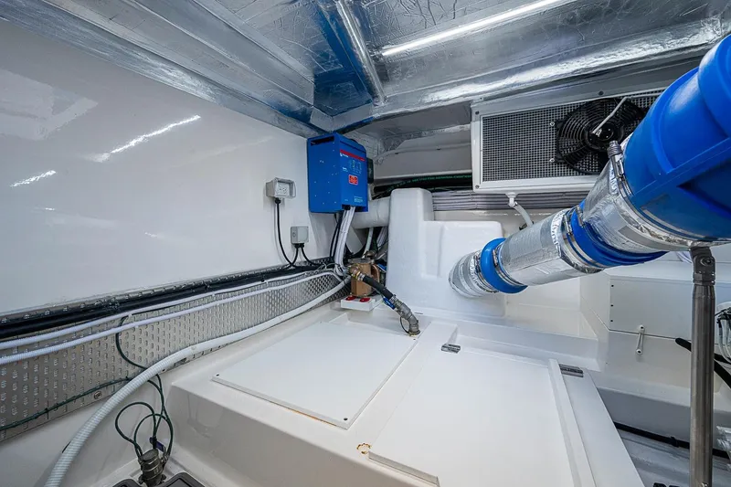 Slide: The Image of Engine room of 2026 Maritimo M50 yacht, showcasing advanced machinery and components. - 107