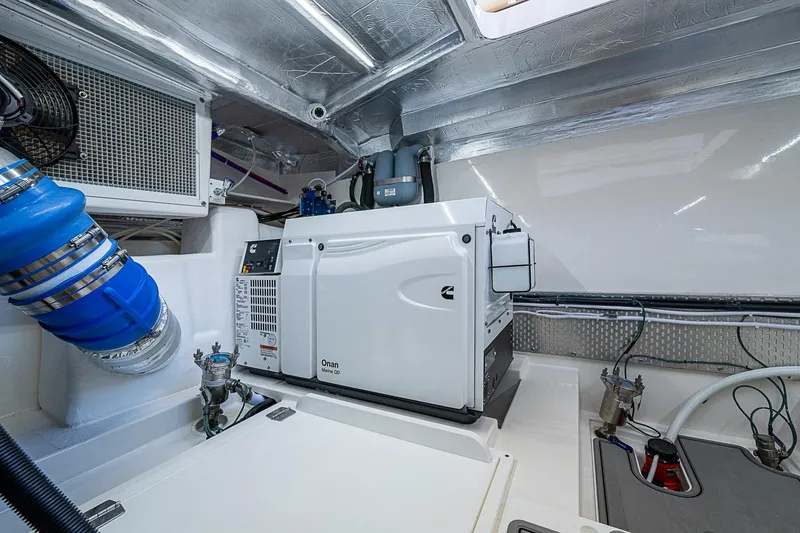 Slide: The Image of Engine room of 2026 Maritimo M50 yacht, featuring advanced ventilation and electrical systems. - 108