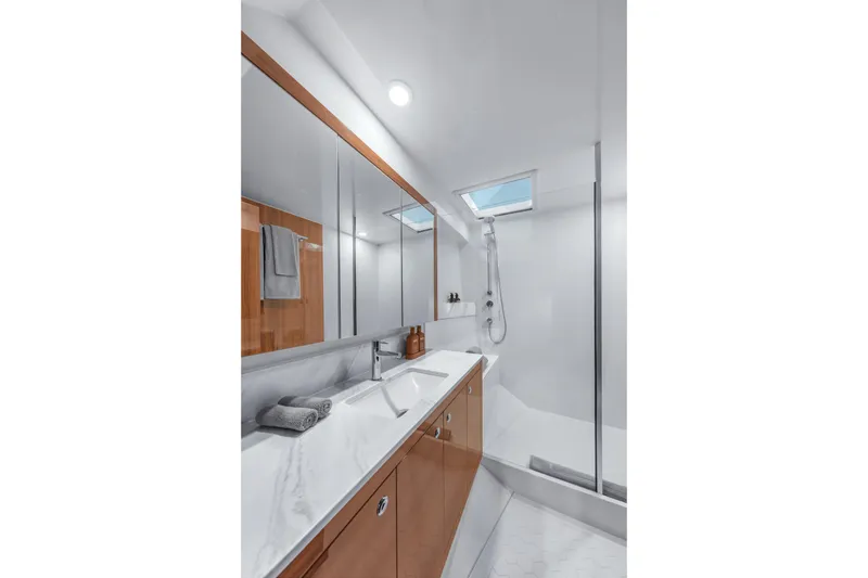 Slide: The Image of Luxurious bathroom in 2026 Maritimo M50 yacht, featuring sleek design and modern fixtures. - 13