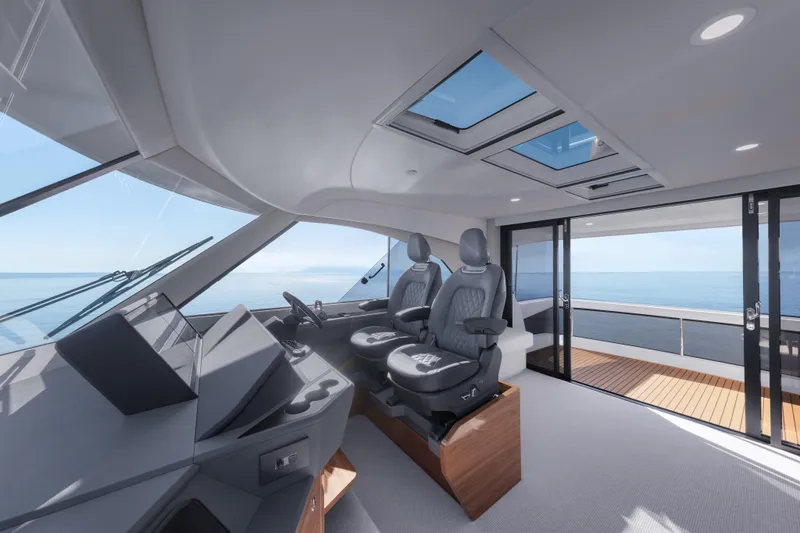 Slide: The Image of Luxurious interior of 2026 Maritimo M50 yacht with panoramic ocean views and modern helm. - 16