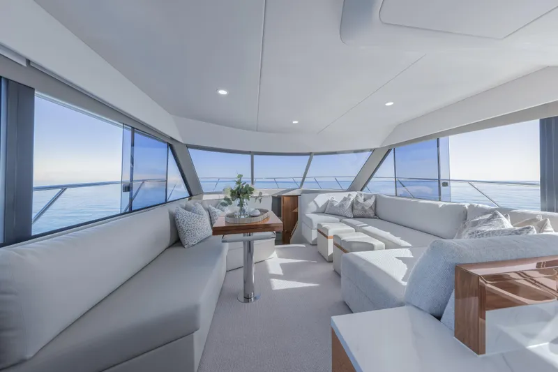 Slide: The Image of Luxurious interior of 2026 Maritimo M50 yacht with panoramic ocean views and elegant seating. - 21