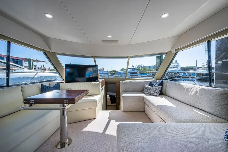 Slide: The Image of Luxurious interior of 2026 Maritimo M50 yacht with spacious seating and panoramic windows. - 32