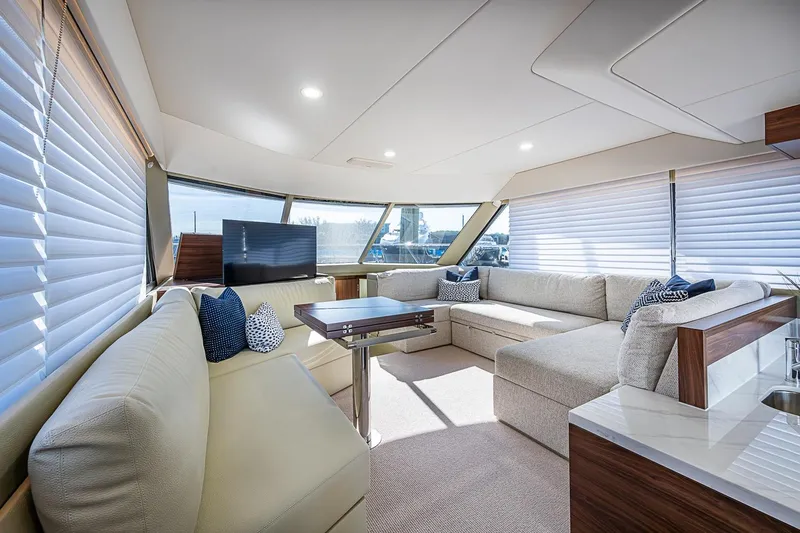 Slide: The Image of Luxurious interior of 2026 Maritimo M50 yacht with plush seating and modern decor. - 34