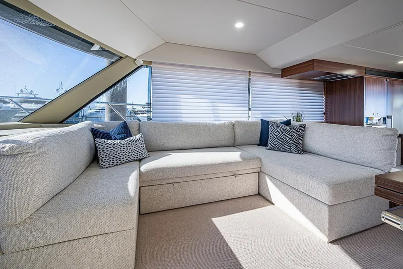 Slide: The Image of Luxurious interior of 2026 Maritimo M50 yacht with plush seating and elegant decor. - 39