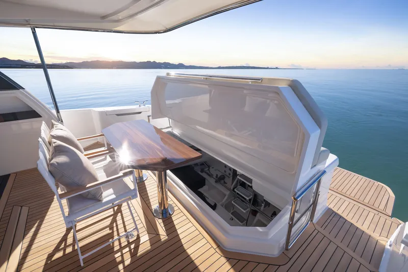 Slide: The Image of Luxury deck of 2026 Maritimo M50 yacht with ocean view and elegant seating. - 4