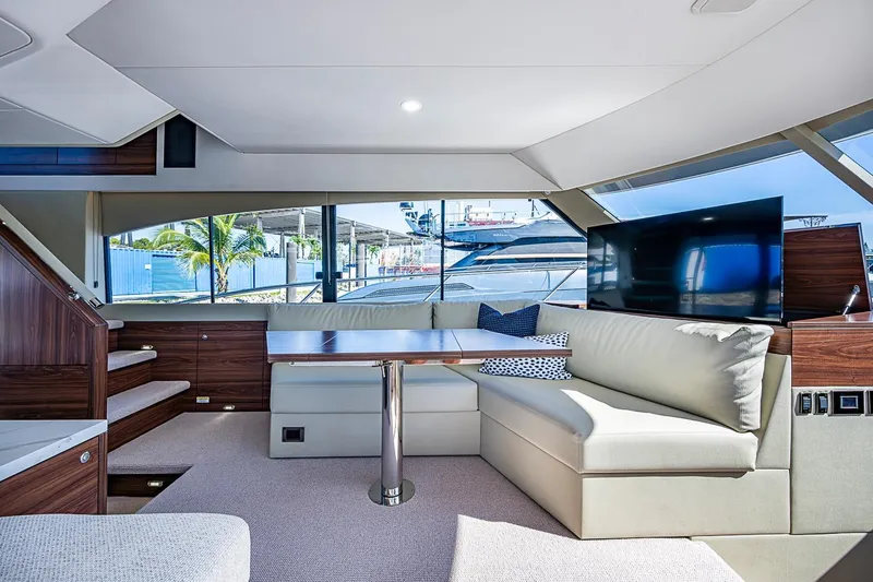 Slide: The Image of Luxurious interior of 2026 Maritimo M50 yacht with modern seating and large windows. - 41