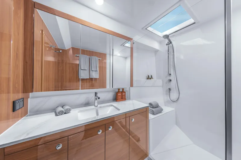 Slide: The Image of Luxurious bedroom interior of 2026 Maritimo M50 yacht with elegant wood finishes. - 43