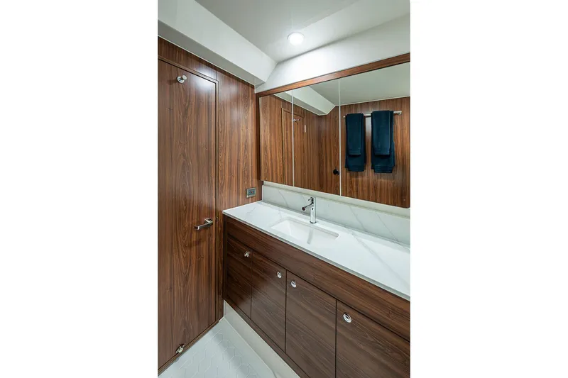 Slide: The Image of Luxurious bathroom in 2026 Maritimo M50 yacht with wood cabinetry and modern fixtures. - 67