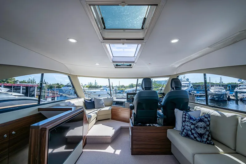 Slide: The Image of Luxurious interior of 2026 Maritimo M50 yacht with modern helm and seating. - 70