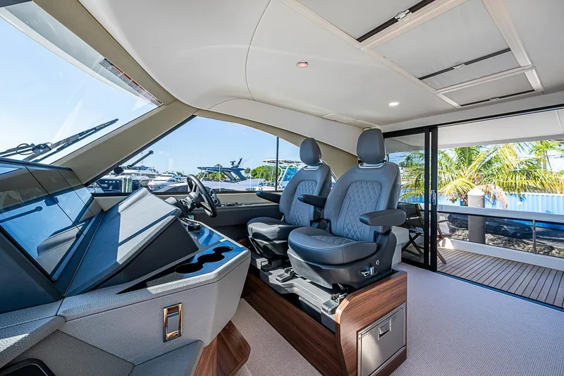 Slide: The Image of Luxurious interior of 2026 Maritimo M50 yacht with modern helm and seating. - 71