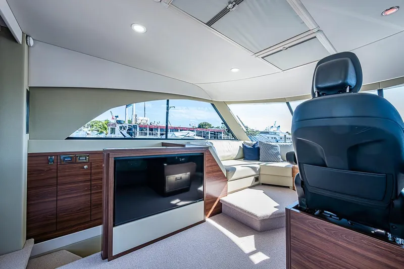 Slide: The Image of Luxurious interior of 2026 Maritimo M50 yacht with modern seating and panoramic windows. - 72