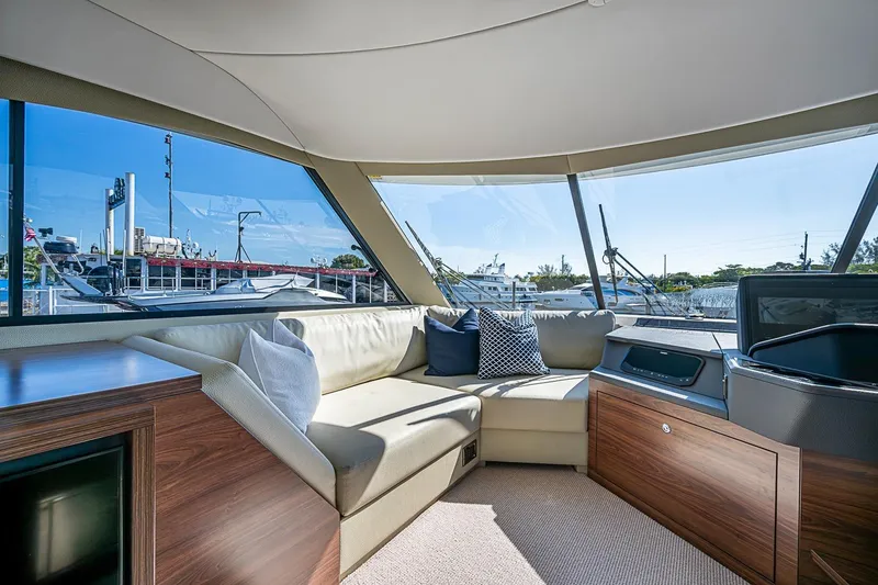 Slide: The Image of Luxurious interior of 2026 Maritimo M50 yacht with plush seating and panoramic windows. - 83