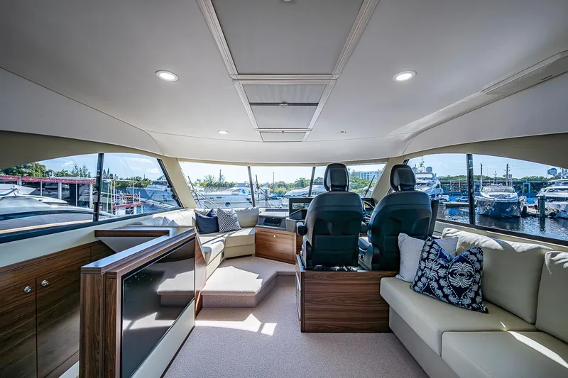 Slide: The Image of Luxurious interior of 2026 Maritimo M50 yacht with plush seating and panoramic windows. - 84