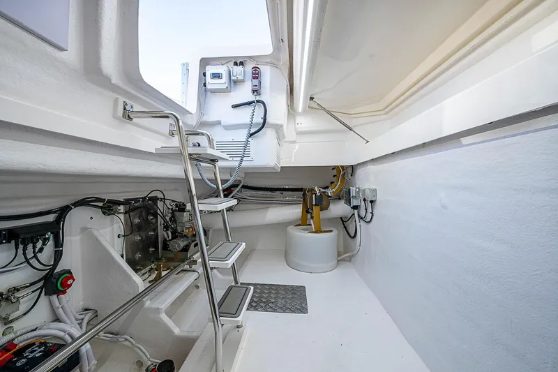 Slide: The Image of Engine room of 2026 Maritimo M50 yacht with ladder and equipment. - 98