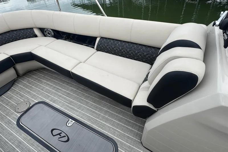 Slide: The Image of Luxurious seating on 2023 Harris Grand Mariner 250 pontoon boat with stylish upholstery. - 10