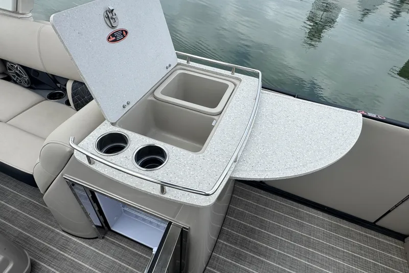 Slide: The Image of Luxury seating and bar area on 2023 Harris Grand Mariner 250 pontoon boat. - 14