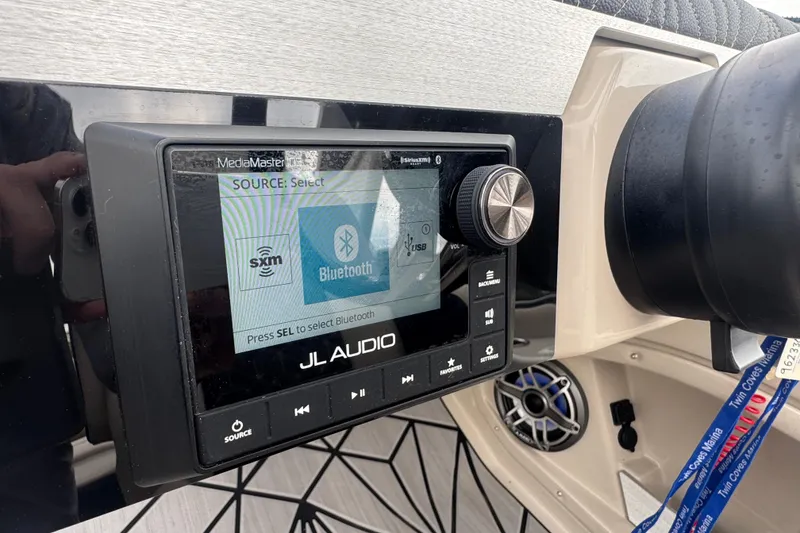 Slide: The Image of JL Audio system on 2023 Harris Grand Mariner 250 boat, featuring Bluetooth connectivity. - 20