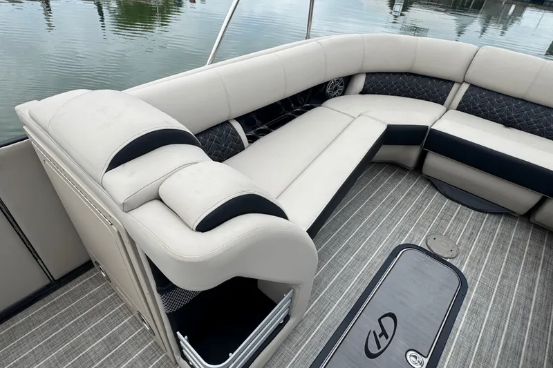 Slide: The Image of Luxurious seating on 2023 Harris Grand Mariner 250 pontoon boat, featuring elegant upholstery and spacious design. - 9