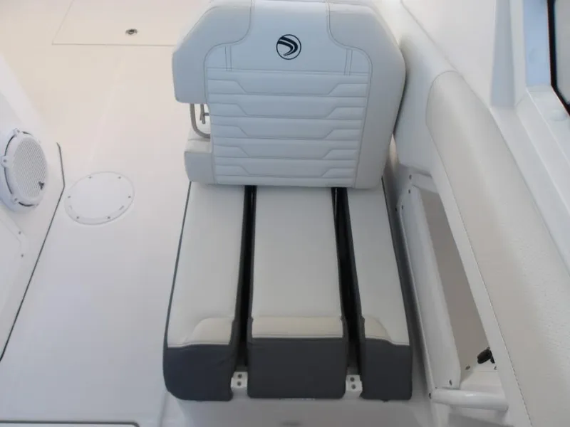 Slide: The Image of 2025 Edgewater 262 CX boat seat with sleek, modern design and white upholstery. - 30
