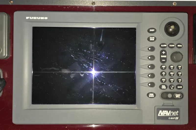 Slide: The Image of Furuno NAVnet marine display on 2005 Tiara 290 Coronet boat dashboard. - 7