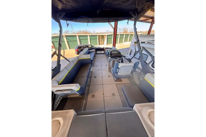 Slide: The Image of 2024 Sea-Doo Switch Cruise Limited 21 interior with spacious seating and modern design. - 2