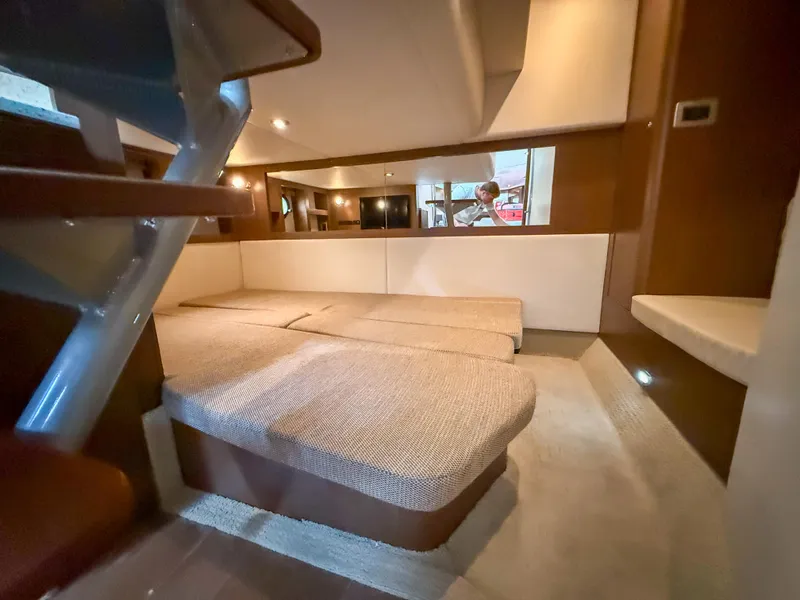 Slide: The Image of Interior of 2016 Sea Ray 350 Sundancer yacht, featuring cozy seating and modern design. - 29