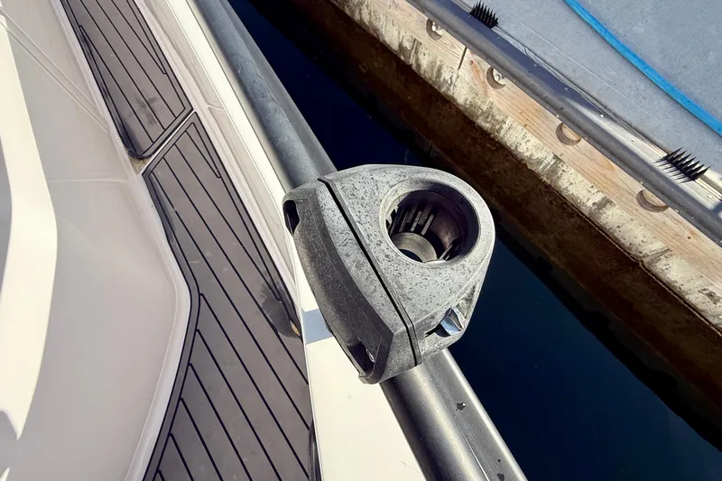 Slide: The Image of 2021 Axopar Brabus 28 Cabin boat detail with dockside view. - 10