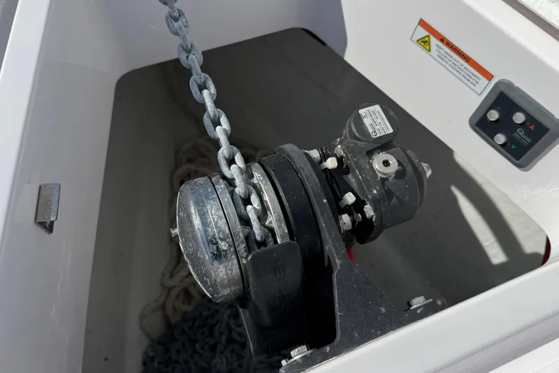 Slide: The Image of Anchor chain mechanism on a 2021 Axopar Brabus 28 Cabin boat. - 28