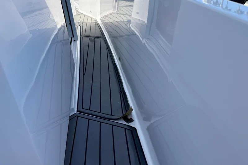 Slide: The Image of 2021 Axopar Brabus 28 Cabin deck with sleek, modern design and non-slip flooring. - 30