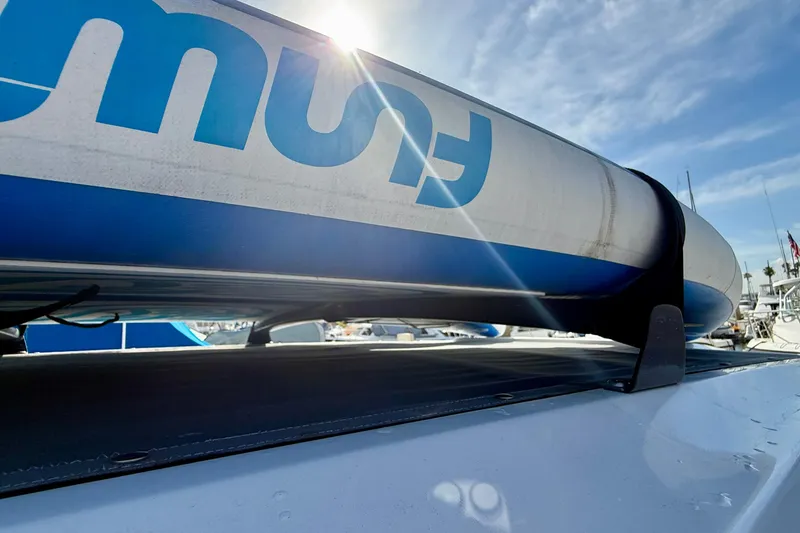 Slide: The Image of Roof-mounted equipment on a 2021 Axopar Brabus 28 Cabin boat under a sunny sky. - 37