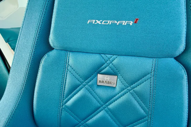 Slide: The Image of Blue seat detail of 2021 Axopar Brabus 28 Cabin with logo embroidery. - 52