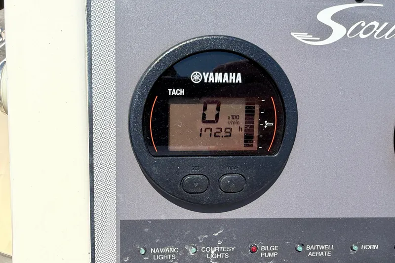 Slide: The Image of Yamaha tachometer on 2017 Scout 175 Sportfish boat dashboard, displaying 172.9 hours. - 17
