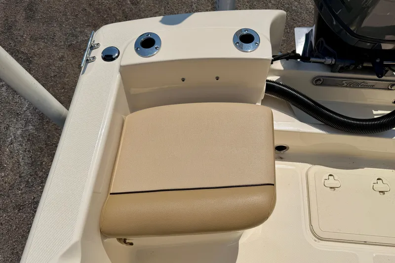 Slide: The Image of 2017 Scout 175 Sportfish boat seat and rod holders on deck. - 21