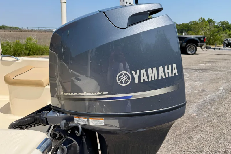 Slide: The Image of Yamaha four-stroke engine on a 2017 Scout 175 Sportfish boat. - 24
