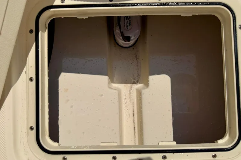 Slide: The Image of Open storage compartment on a 2017 Scout 175 Sportfish boat. - 25