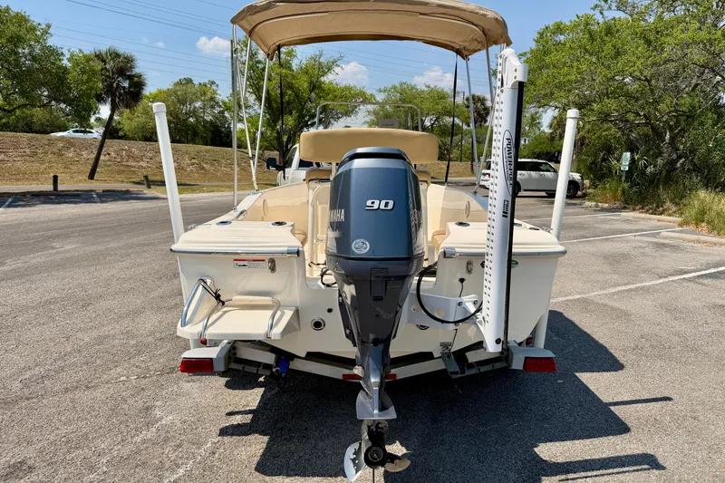 Slide: The Image of 2017 Scout 175 Sportfish boat with Yamaha 90 engine, parked outdoors. - 8