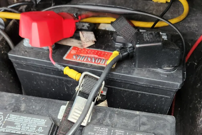 Slide: The Image of Battery in 2011 Ranger Z520 boat with cable connections. - 14